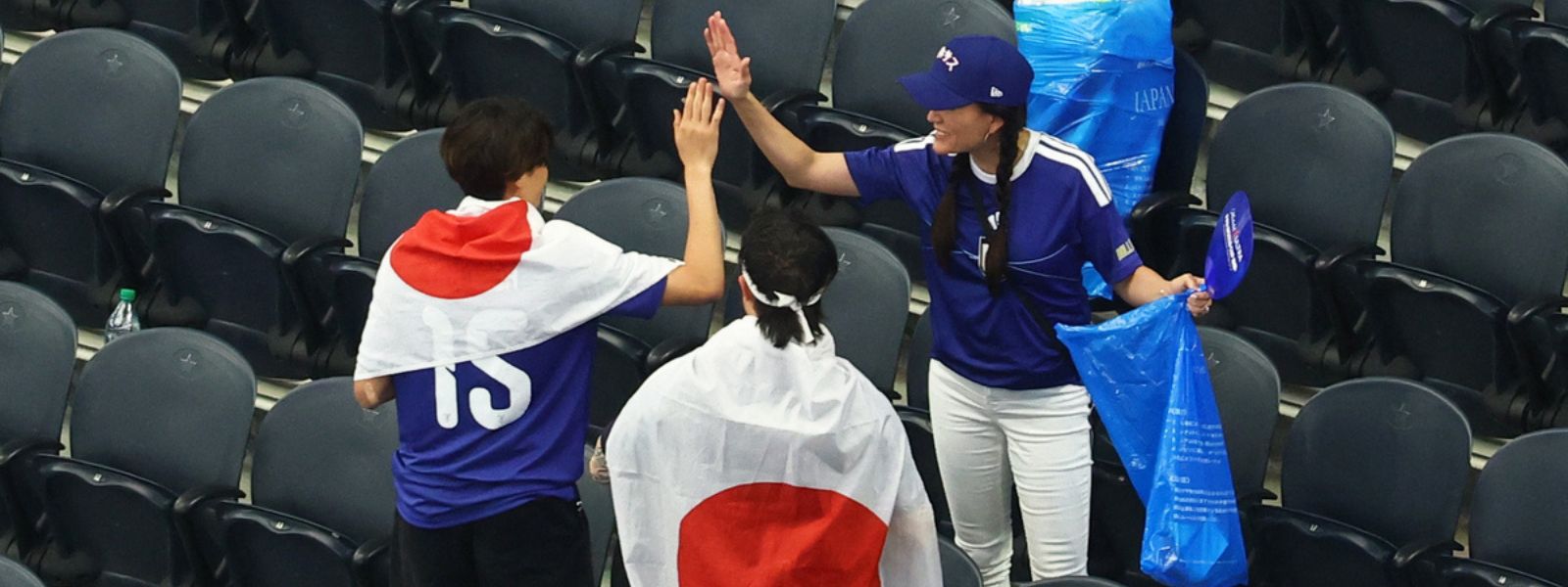 Japan Fans Stay Back to Clean Stadium After Match